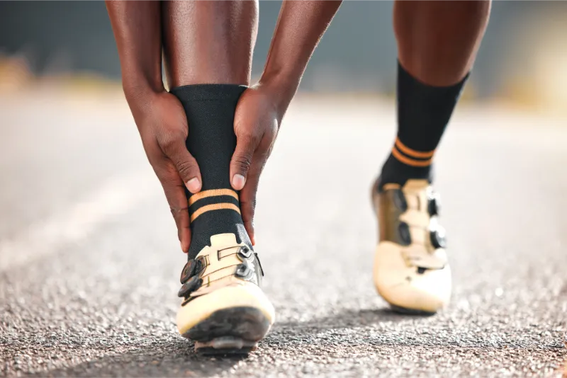 foot pain and man in the road for fitness cardio 2023 11 27 05 04 34 utc 1