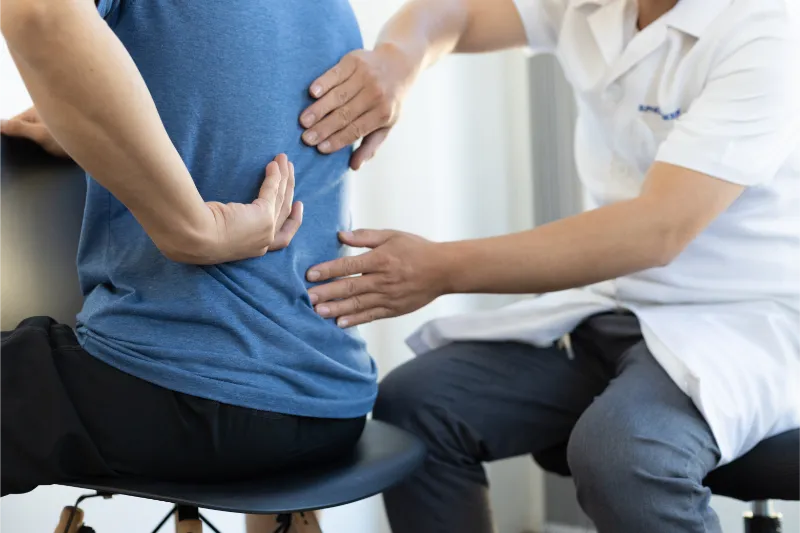 Back Pain 1 the doctor is diagnosing the patient s back pain 2023 11 27 05 22 43 utc