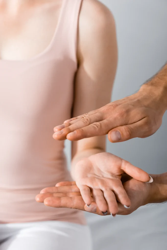 Applied Kinesiology 3 partial view of woman and healer cleaning her aura 2024 11 10 02 57 45 utc
